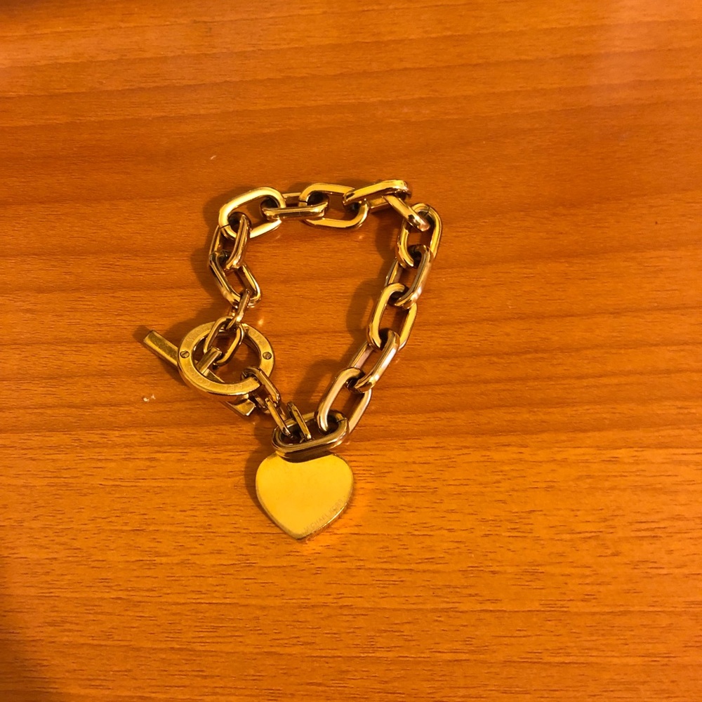 Michael Kors Rose Gold bracelet with charm